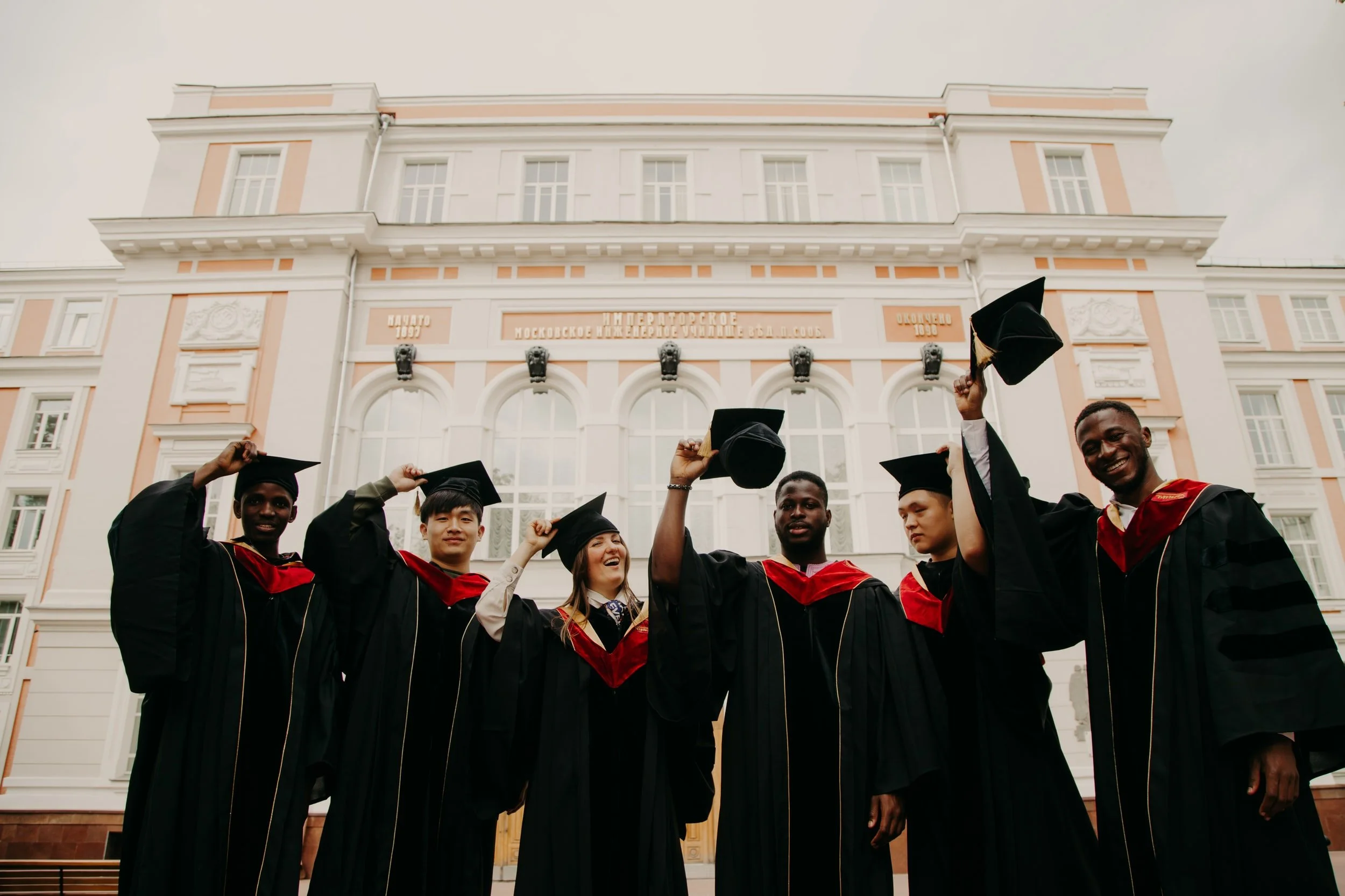 A diverse group of students celebrating together